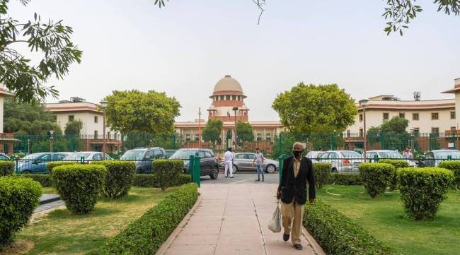 The Supreme Court noted that the spread of PMLA is now too wide to cover the violation of laws regarding copyright, trademark, SEBI, child labour, bonded labour, emigration, passport, environment, air and water pollution, plant protection, antiquities, IT & privacy and cheating and prostitution. (Express Archives)