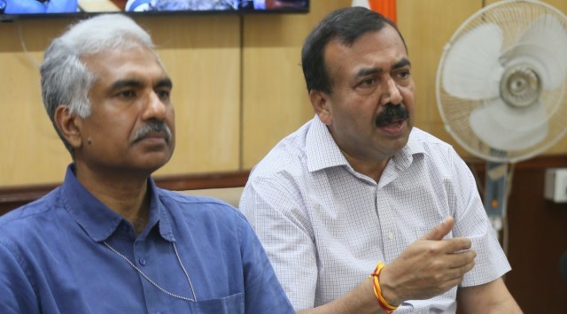 Secretary (Food) Sudhanshu Pandey (C) and Secretary Agriculture Manoj Ahuja (L) during a press conference in New Delhi, Saturday, May,14, 2022. (Express Photo By Amit Mehra)