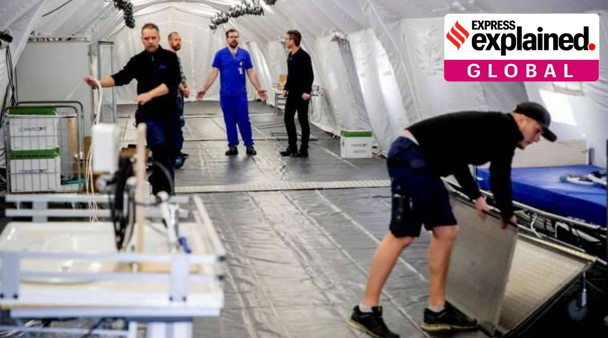 Military personnel prepare a field hospital in Gothenburg in March 2020. (AP Photo/File)