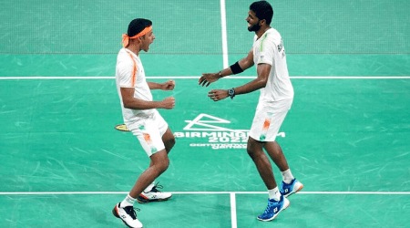 India's Chirag Chandrasekhar Shetty and Satwik Sairaj Rankireddy celebrate victory against England's Sean Vendy and Ben Lane in the Men's Doubles Gold Medal Match at The NEC. (AP)