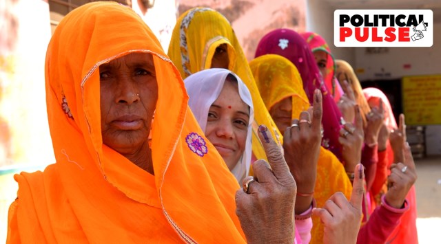 Women show the indelible ink marked after casting vote for the state Assembly elections. (Express File Photo by Rohit Jain Paras)