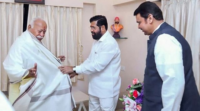 Maharashtra CM Eknath Shinde and Deputy CM Devendra Fadnavis meet RSS Chief Mohan Bhagwat at his residence in Mumbai. (PTI Photo)