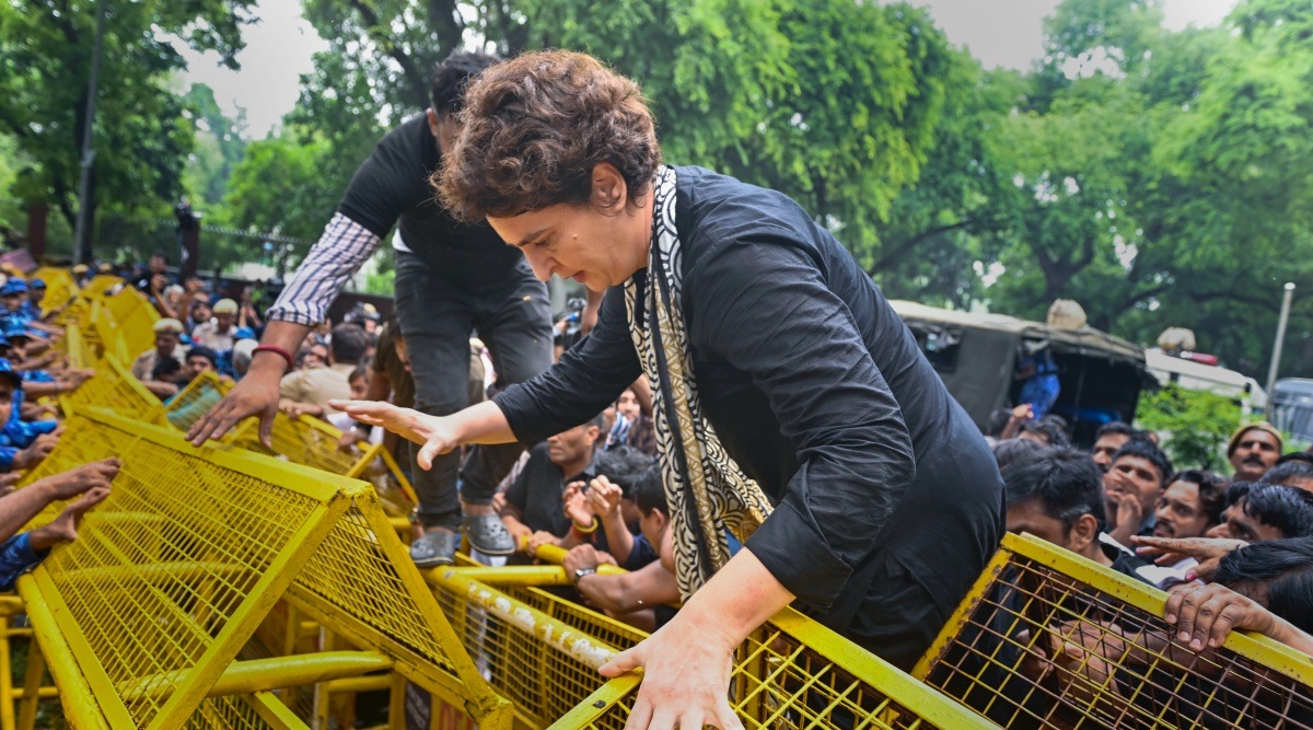 Congress leader Priyanka Gandhi, wearing black clothes, during a protest march as part of partys nationwide protest over price rise, unemployment and GST hike on essential items, in New Delhi, Friday, Aug. 5, 2022. (PTI Photo)
