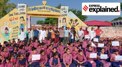 Students and parents protesting outside a government school in Faridabad, Haryana