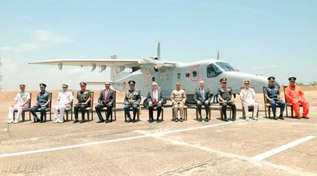 Indian envoy in Sri Lanka with Sri Lanka Navy personnel and others during a ceremony for the handover of a Dornier 228 Maritime Patrol Aircraft to Sri Lanka to enhance their maritime surveillance capabilities and bolster the bilateral defence ties, in Colombo. (PTI Photo)
