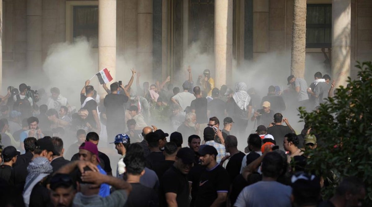 Muqtada al-Sadr gave his supporters an hour to leave. (AP Photo/Hadi Mizban)