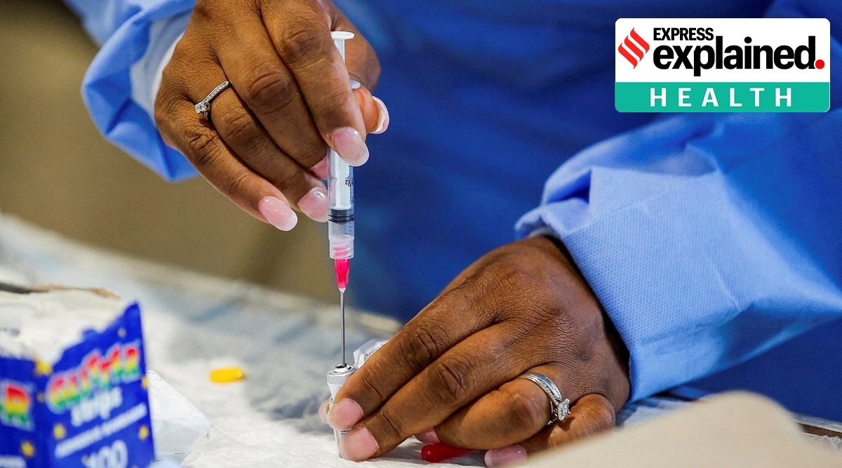 A staff member of the Westchester Medical Center prepares a monkeypox vaccine in a drive-through monkeypox vaccination point at the Westchester Medical Center in Valhalla, New York, July 28, 2022. (REUTERS)