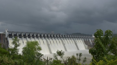 Around 2 pm Sunday, eight more radial gates were opened to a height of 60 centimetres to increase the release downstream to one lakh cusecs as the water level in the dam is recording a rise of four-centimetre per hour.(Express Photo)