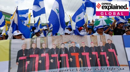  Anti-government demonstrators hold a banner featuring a group of Catholic cardinals including Nicaraguan Leopoldo Brenes, center right, and a quote from John Paul II that reads in Spanish, "The Church is the first to want peace!", during a march supporting the Catholic Church, in Managua, Nicaragua, July 28, 2018.  (AP Photo/Alfredo Zuniga, File)