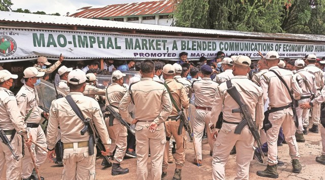 Protesting students and police personnel at the site of agitation in Imphal, Manipur, Saturday. (Express Photo)