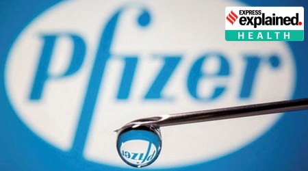 pfizer logo reflected in syringe drop