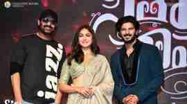 Prabhas, Mrunal Thakur, and Dulquer Salmaan pose for pictures at the pre-release event of Sita Ramam. (Photo: Twitter/VyjayanthiFilms)