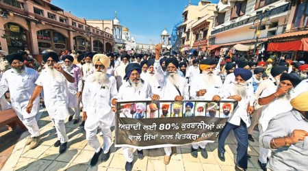 Sgpc president Harjinder Singh Dhami with members and employees taking out protest march for releasing Sikh prisoners, Amritsar on Saturday,  August 13 2022. EXPRESS PHOTO BY RANA SIMRANJIT SINGH