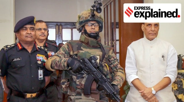 Union Defence Minister Rajnath Singh hands over indigenously-developed Future Infantry Soldier as a System (F-INSAS) to the Indian Army in the presence of Army Chief General Manoj Pande, in New Delhi, Tuesday, Aug. 16, 2022. (PTI Photo)    