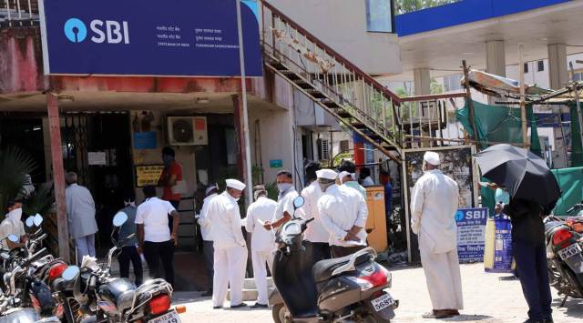 The hit on account of mark-to-market (MTM) losses amounted to Rs 6,549 crore. The MTM hit also had an adverse impact on the SBI’s return on assets (RoA) and return on equity (RoE), which were down 9 bps and 203 bps on a y-o-y basis, respectively. (Express Photo by Pavan Khengre)