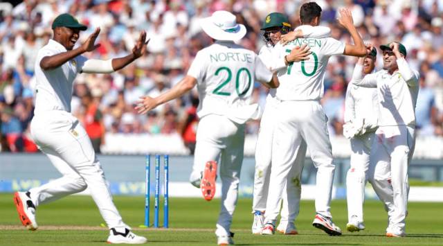 South Africa players celebrate as they win the match by an innings and 12 runs on the third day. (AP Photo) 