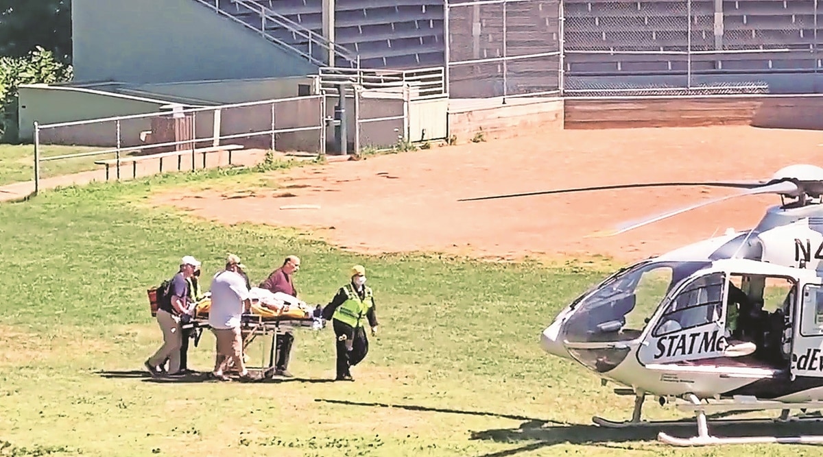 Salman Rushdie is being taken to a helicopter. (Reuters)