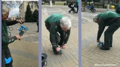 World’s smallest cycle, Russian man rides world’s smallest bike, Sergey Dashevsky Russia world’s smallest cycle, Sergey Dashevsky Moscow world record, Viral video World record, Indian Express