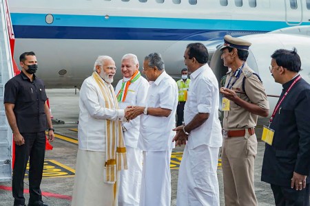 Prime Minister Narendra Modi is being greeted by Kerala CM Pinarayi Vijayan and Governor Arif Mohammad Khan
on his arrival at Kochi International Airport for his two day visit in Kochi on Thursday, Sept. 1. (PTI)