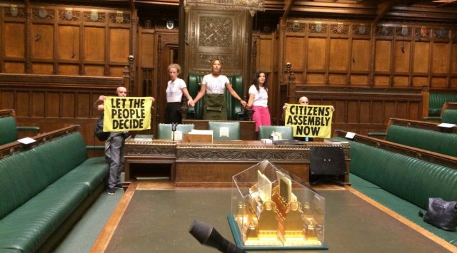 Extinction Rebellion activists protest inside the House of Commons in London, Britain September 2, 2022. (Extinction Rebellion UK/via REUTERS)