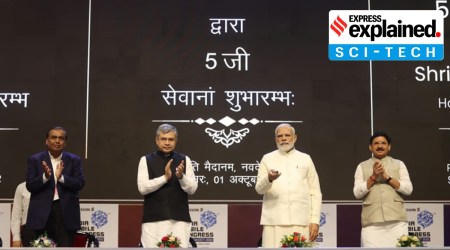 Prime Minister Narendra Modi launches the 5G services at the India Mobile Congress, in New Delhi on Saturday. (Express Photo: Praveen Khanna)