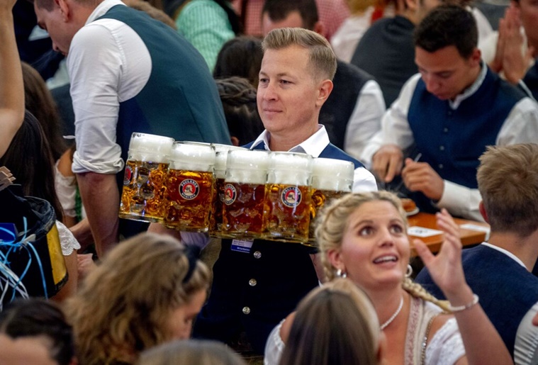 Oktoberfest, Oktoberfest returns, Oktoberfest in Munich, beer fest, Oktoberfest pandemic hiatus, indian express news