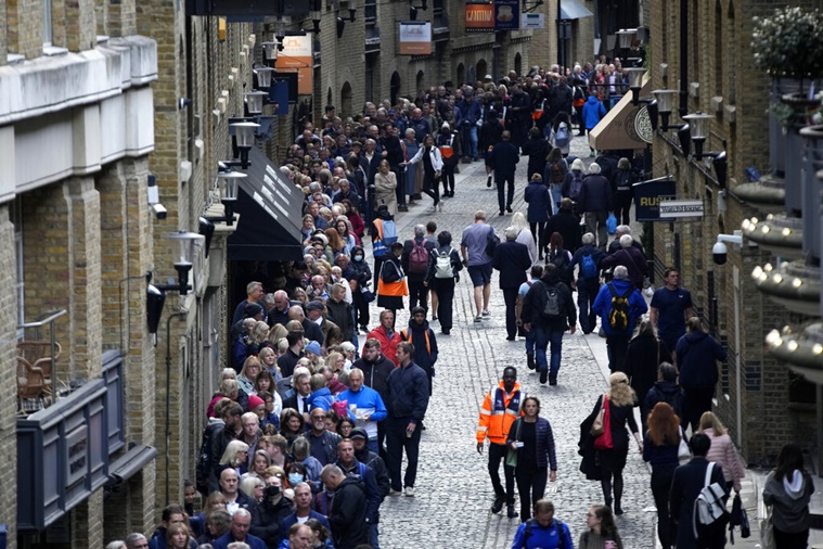 London tourism, tourists in London, Queen Elizabeth II funeral, people taking part in Queen Elizabeth II funeral, royal family fans, guests in London, Queen Elizabeth II fans in London, tourism boost London, indian express news