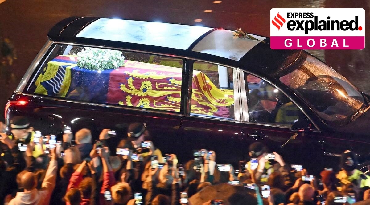 The coffin of Queen Elizabeth II in the royal hearse travels to Buckingham Palace in London, Tuesday Sept. 13, 2022. (AP)