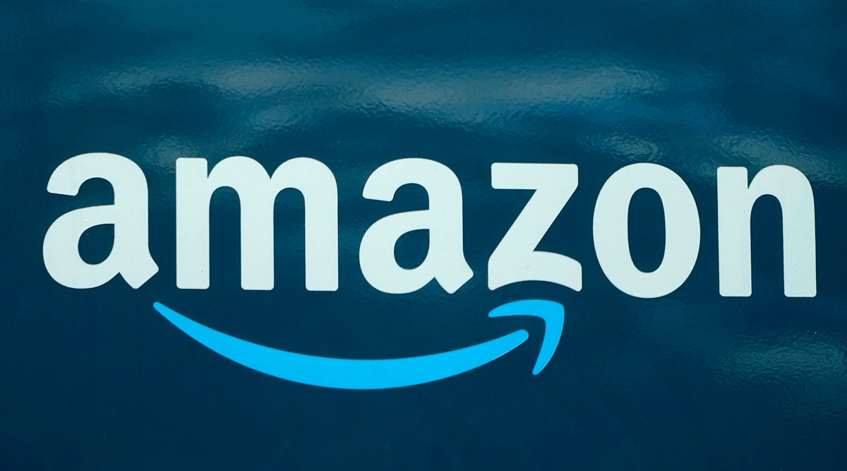 An Amazon logo appears on an Amazon delivery van in Boston, Oct. 1, 2020. On Thursday, Sept. 1, 2022, a hearing officer for a federal labor board rebuffed Amazon's attempt to scrap a historic union win at a warehouse on Staten Island, N.Y., handing victory to organizers in what could be a very long battle for recognition. (AP Photo/File)