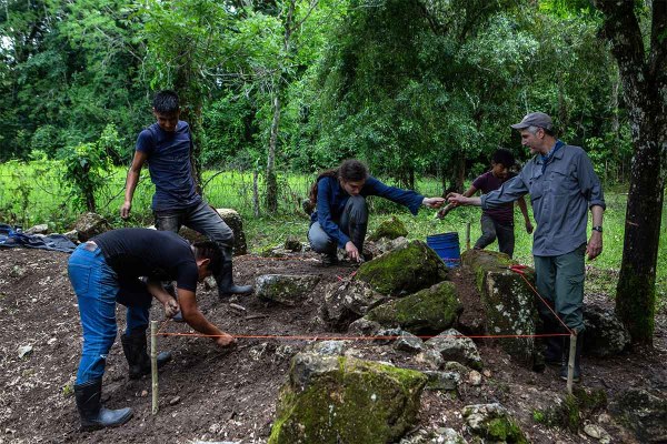  members of the archaeological team excavating a potential monument site at Sak Tz’i’ in Chiapas, Mexico