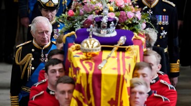 King Charles III, King Charles III tribute to Queen Elizabeth II, King Charles III news, King Charles III flowers, King Charles III wreath for Queen Elizabeth II, Queen Elizabeth II funeral, Queen Elizabeth II coffin, indian express news