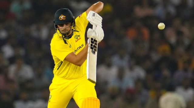 Australia's Tim David plays a shot during the first T20 cricket match between India and Australia, in Mohali, India, Tuesday, Sept. 20, 2022. (AP Photo/Manish Swarup)