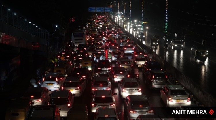 Long traffic jams were seen in Delhi on Thursday as rains led to waterlogging on many roads. (Express Photo: Amit Mehra)