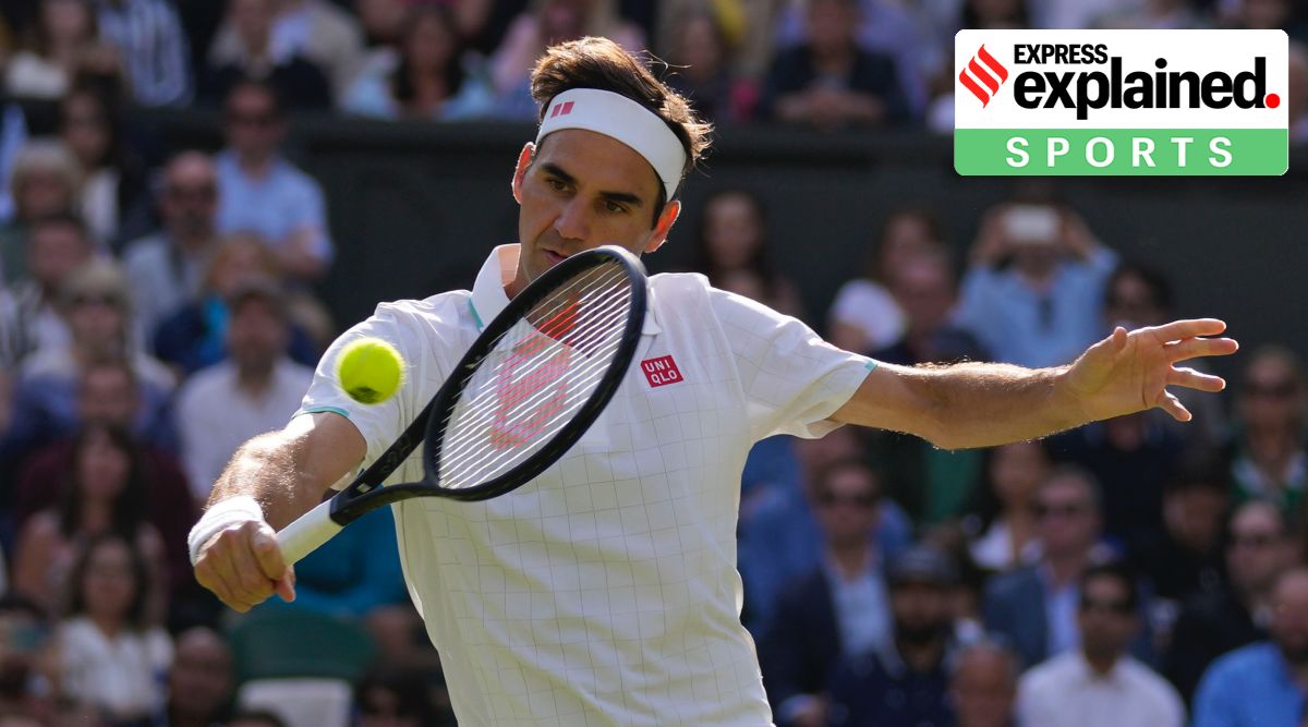 Roger Federer plays a return during the men's singles quarterfinals match at Wimbledon in London, Wednesday, July 7, 2021. (AP Photo/Kirsty Wigglesworth, File)

