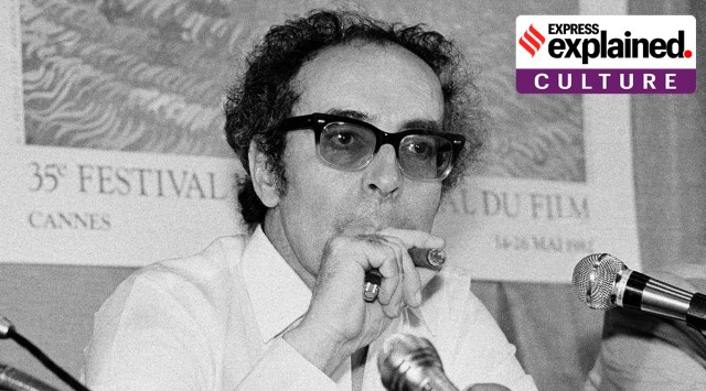 Film director Jean-Luc Godard smokes at Cannes festival, France on May 25, 1982. (AP Photo/Jean-Jacques Levy, File)