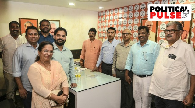 Goa Chief Minister Pramod Sawant and BJP Goa President Sadanand Shet Tanavade with eight Congress MLAs who joined the party, in Panaji, Wednesday, Sept. 14, 2022. (PTI Photo)