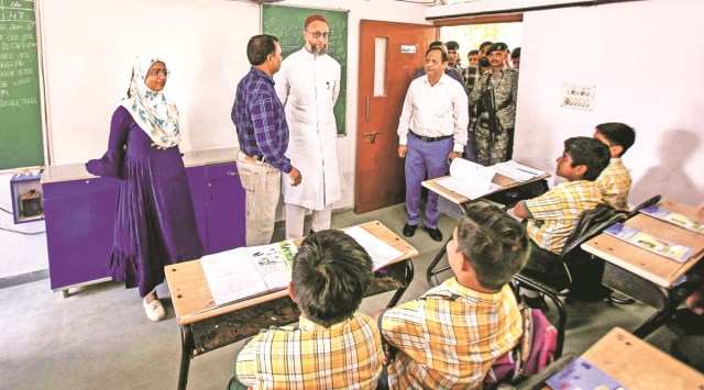 AIMIM chief Asaduddin Owaisi visits a school in Ahmedabad, Saturday. (PTI Photo)