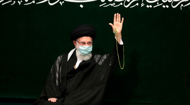 Supreme Leader Ayatollah Ali Khamenei waves to his well-wishers during a religious ceremony, in Tehran. (AP)