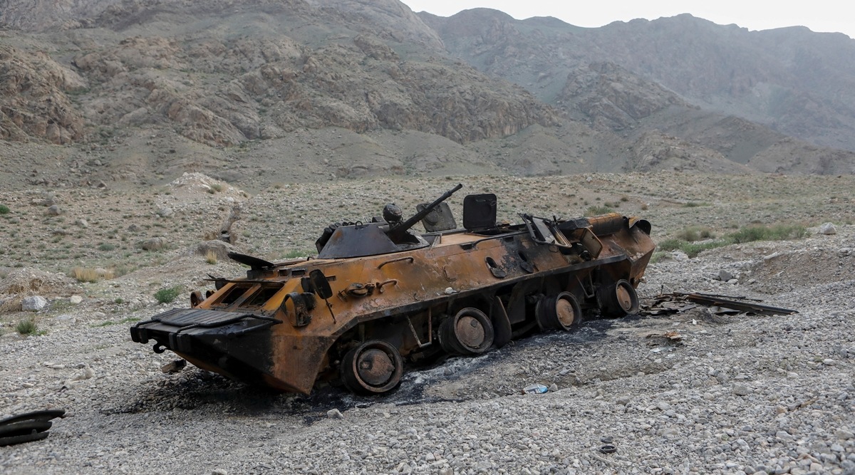 FILE PHOTO: A view shows a burnt armoured personnel carrier of Kyrgyz forces near Golovnoi water distribution facility outside the village of Kok-Tash in Batken province, Kyrgyzstan May 5, 2021. (REUTERS/FILE)