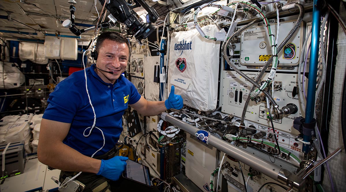 NASA astronaut and Expedition 62 Flight Engineer Andrew Morgan with the Bio-Fabrication Facility (BFF), a 3D bioprinter. (Image credit: NASA) 
