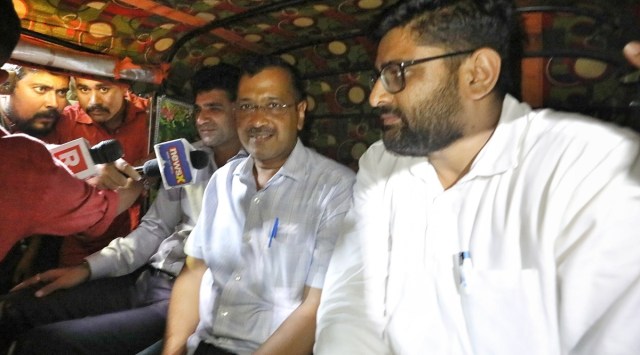 Arvind Kejriwal at auto driver Vikram Dantani’s home. (Express photo by Nirmal Harindran)
