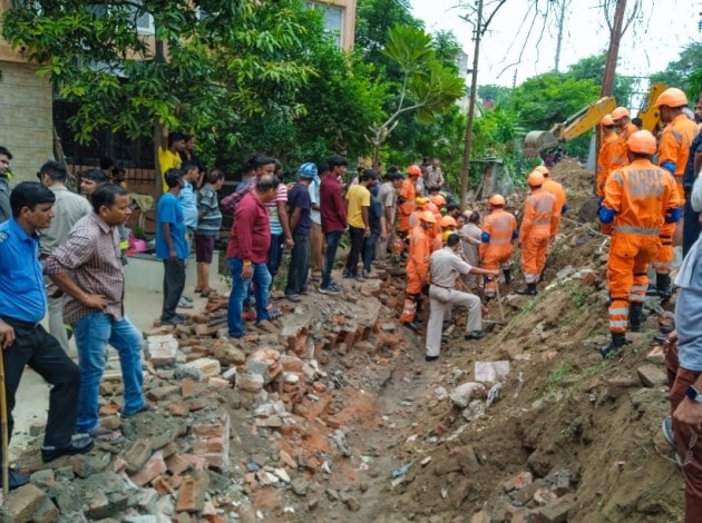 Noida housing society wall collapses, indian express