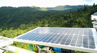 A sound recording device made out of a Raspberry Pi and other components being used to monitor biodiversity in a forest.