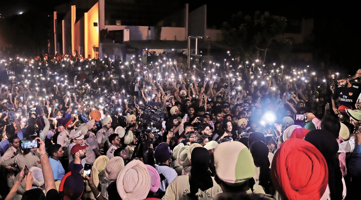 Sea of protesters: Students donned black to protest against leaked objectionable videos of women students at Chandigarh University, Gharuan, on Sunday evening.  (Express Photo by Jasbir Malhi)