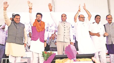 Himachal Chief Minister Jai Ram Thakur and Union Minister Anurag Thakur during a rally in Una, Saturday. (PTI Photo)
