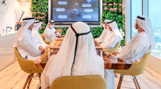  In this photo made available from the twitter account of UAE Vice President and Prime Minister and ruler of Dubai, Emirati officials brief Sheikh Mohammed bin Rashid Al Maktoum about a possible moon mission, Sept. 29, 2020, in Dubai, United Arab Emirates. (Image credit: Sheikh Mohammed bin Rashid Al Maktoum Twitter account via AP, File) 