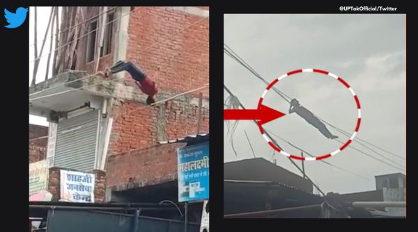 Man in Uttar Pradesh gets up on high voltage wires, bangle seller climbs high voltage wires, Man performs stunts on electric wires in UP market, viral video man climbs electric wires in Amaria UP, youth in Pilibhit climbs wires and performed stunts, Indian express