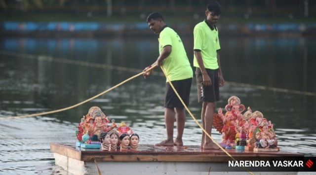 Gauri Ganpati immersion at Koparkhairane NMMC pond in Navi Mumbai on Monday. (Express photo by Narendra Vaskar)