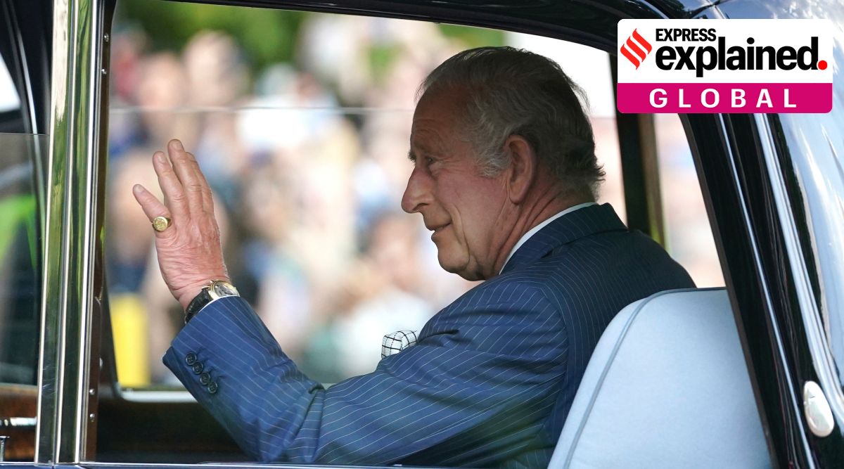 King Charles III waves to members of the public outside Clarence House, London, after he was formally proclaimed monarch by the Privy Council, Saturday Sept. 10, 2022. (Zac Goodwin/PA via AP)