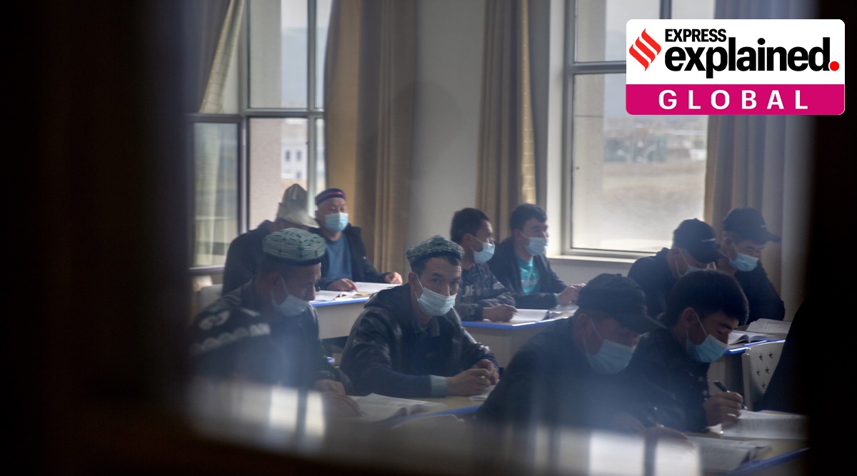 Students training to become imams recite verses from the Quran at the Xinjiang Islamic Institute in Urumqi, the capital of China's far west Xinjiang region, during a government organized visit for foreign journalists on April 21, 2021. (AP Photo)